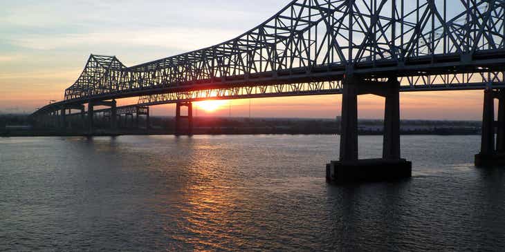 Old Vicksburg Bridge (also known as the "Mississippi River Bridge") at sunrise.
